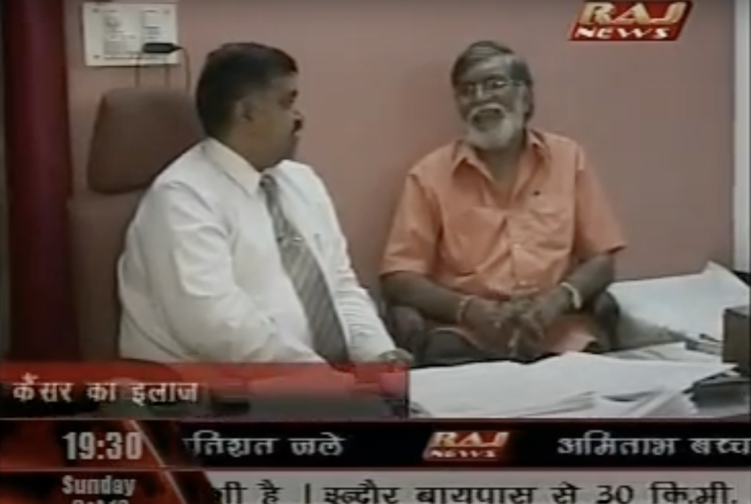 Dr. Tomar consulting with a patient